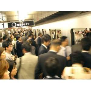 Commuters Boarding Train During 8Am Rush Hour at Ueno Station, Ginza 