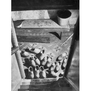  Wooden Shoes in a Hallway at the Bottom of the Stairs 