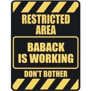   RESTRICTED AREA BABACK IS WORKING  PARKING SIGN