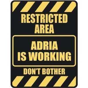   RESTRICTED AREA ADRIA IS WORKING  PARKING SIGN