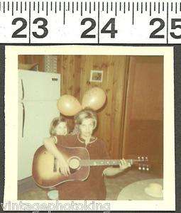   OLD PHOTO/MOTHER PLAYING GUITAR WHILE GIRL HAS BALLOONS BEHIND HER(544