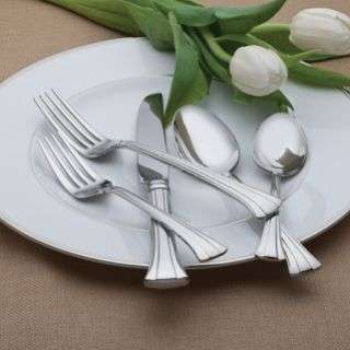   flatware is rendered in weighty stainless steel and feature a sweeping