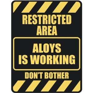   RESTRICTED AREA ALOYS IS WORKING  PARKING SIGN