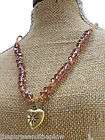 NEW FOSSIL BRASS HEART LEATHER CORD NECKLACE PINK CRYS