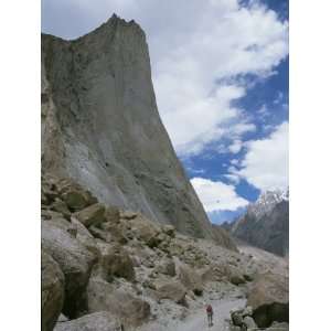  A Man Hikes Down a Road in the Eastern Karakoram Mountains 