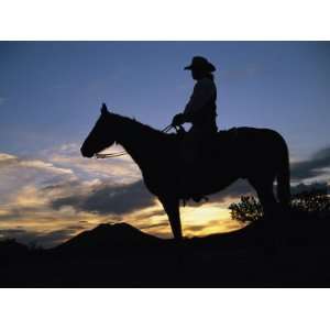 Cowboy Silhouetted against a Sunset at This Western Movie Location 