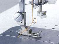Automatic Needle Threader The push lever automatic needle threader 