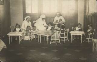 ORPHANAGE ?? Nuns Tend to Babies and Little Children c1910 Real Photo 
