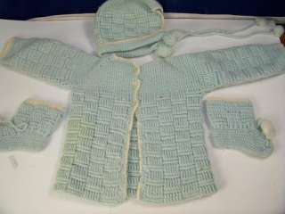 Baby blue yarn knit crochet. Pair of bootys 3 1/2 x 3 Baby hat with 