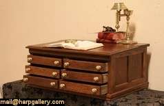   lid slant top desk for a ledger, it would make a nice jewelry chest