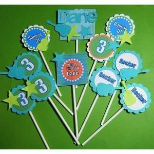   Cupcake toppers, set of twelve Rocks star guitar design Toys & Games
