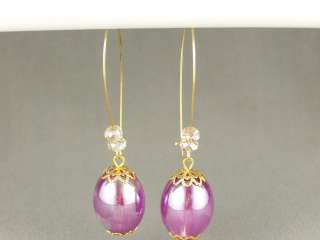 Gold tone oval kidney wire hoop dangle earrings 2 7/8 long iridescent 