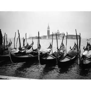  Gondolas and Gondoliers on a Rainy Day in Venice Italy 