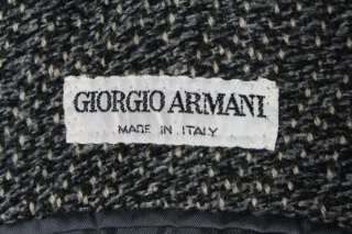 Thisis an AWESOME vintage blazer by Giorgio Armani. It is a black 