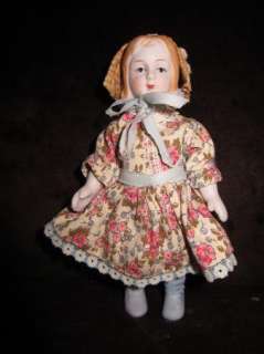 Miniature dollhouse all bisque doll with wicker bonnet cute  