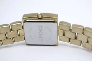 New DKNY Women Steel Gold Bracelet Pearl Dial Watch 21mm x 21mm NY4880 