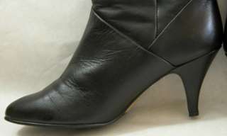 THESE SHARP BLACK LEATHER CALF LENGTH BOOTS BY D.EVANS ARE A MUST FOR 