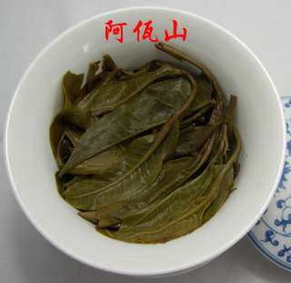   Mangjin Organic Ancient Tea Tree Raw Pu erh Tea Cake 357g  