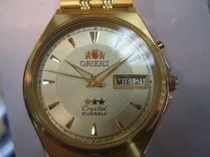 ORIENT JAPAN MENS WATCH AUTOMATIC 21 JEWELS STAINLESS GOLD TONE 