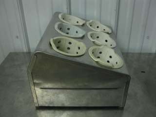 You are looking at a stainless steel 6 hole silverware caddy / drying 