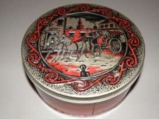 Neat vintage horse and carriage cookie tin  