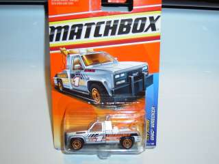 2011 matchbox #73  GMC WRECKER  SILVER  