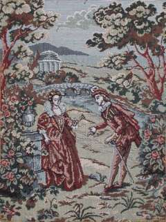 This miniature tapestry in the Victorian style shows a romantic scene 
