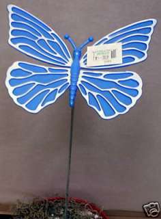 blue butterfly garden or plant stake. It is plastic. The butterfly 