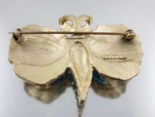 You are bidding on a DESIGNER Gold Tone Blue Crystal Butterfly Brooch 