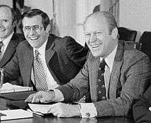 Secretary of Defense Rumsfeld shares a laugh with President Ford in a 