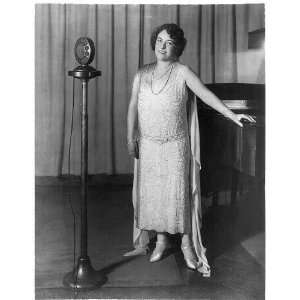  Frances Alda,between piano and radio microphones
