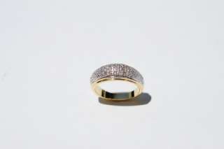 You are buying a new 18K Gold over Sterling Silver Diamond Ring