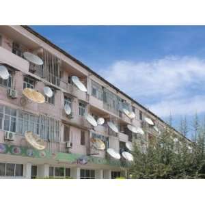  House Block in Old Soviet Style with Satellite Dishes 