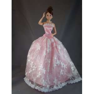 Adorable Pink Strapless Ball Gown with White Lace with a Flower Motif 