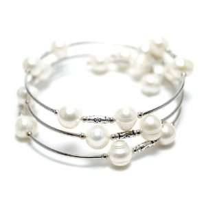    Triple row white freshwater pearls in silver bracelet. Jewelry